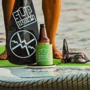 Zoomed in photo of a green SUPBUDDY Koozie on a Stand Up Paddleboard on the beach - BUOY WEAR