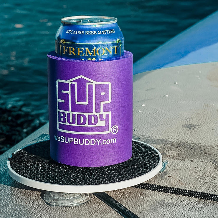 Zoomed in photo of a purple SUPBUDDY Koozie on a Stand Up Paddleboard in the water - BUOY WEAR
